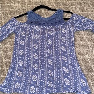 Cold shoulder shirt with lace on top.